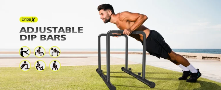 "A man is performing a dip exercise on an adjustable dip bar set outdoors near the ocean."